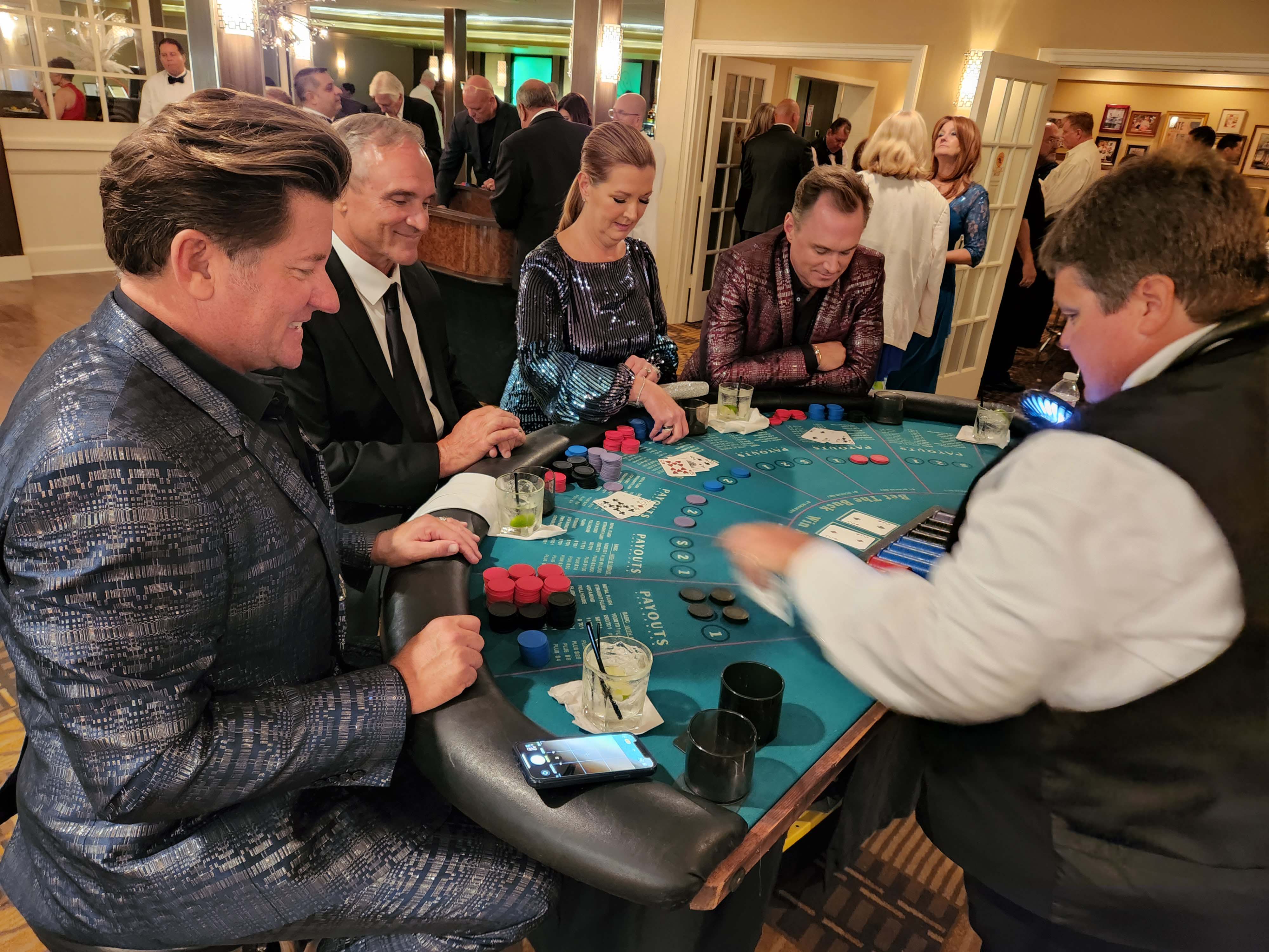 Blackjack players enjoying the festivities at a charity fundraiser in Galveston.